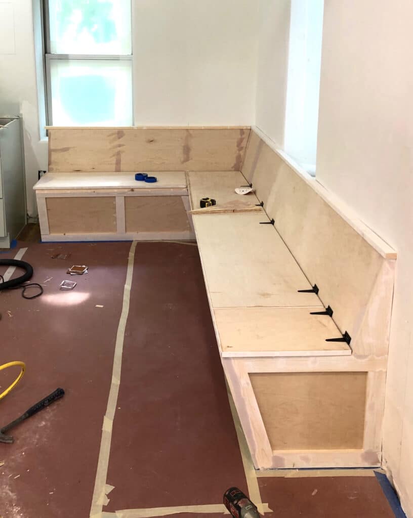 Custom Corner Bench with storage built by Tekton Contracting KC